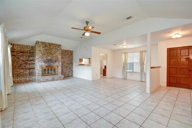 Large living room, looking toward dining space and kitchen