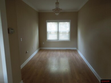Large formal dining with laminate flooring
