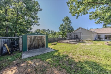 Storage shed included