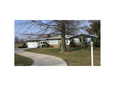 long driveway with additional parking space/turnar