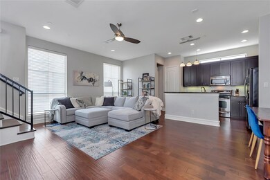 Large living area with beautiful hardwoods