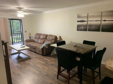 partially furnished living/dining area