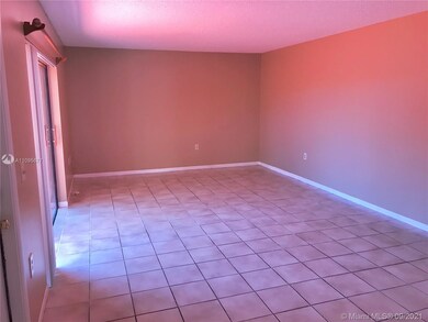 Living room with sliding doors to the court yard.