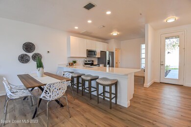 Dining Room Opens To The Kitchen