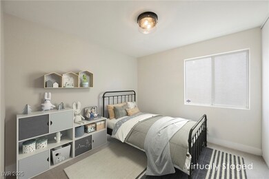 Carpeted bedroom featuring baseboards