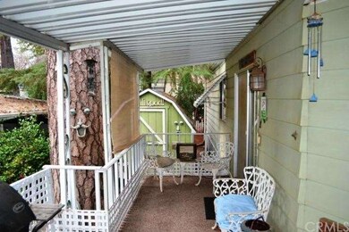 An opposing view of the front porch with storage s