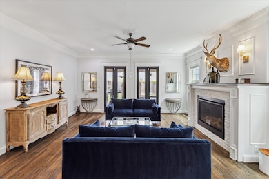 Double French doors lead you to the covered patio