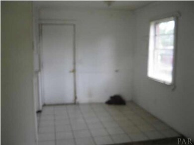 brick home with dinning off kitchen