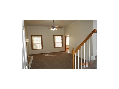 Great room with fireplace, new carpet throughout h