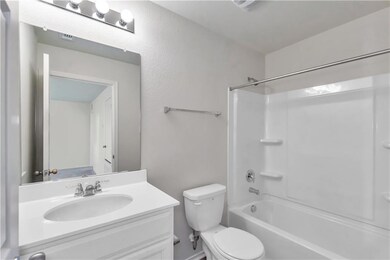 Full bath featuring vanity and  shower combination