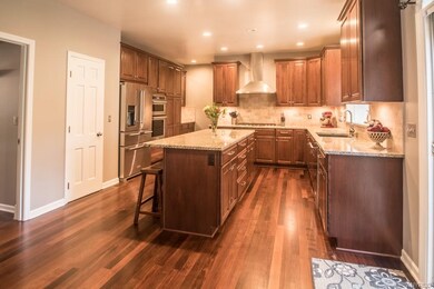 Kitchen, newly remodeled with maple cabinets, gran