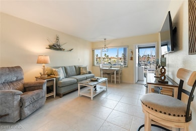Living room featuring light tile patterned floorin