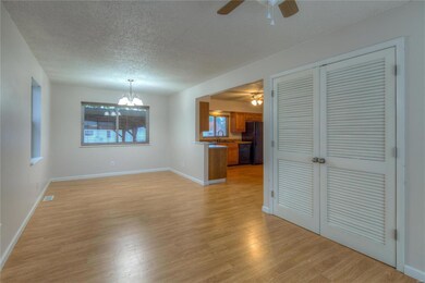 The expansive Family Room/Dining Area combo gives 