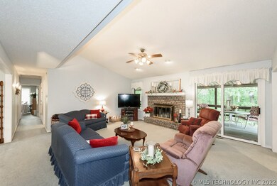 Main living space with vaulted ceiling and wood bu
