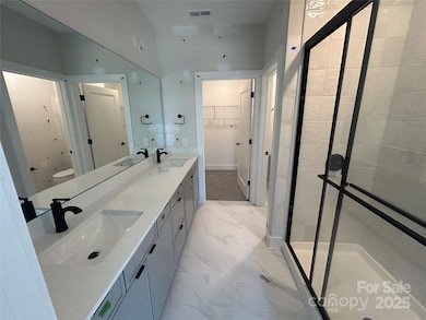Example Kitchen - Not Exact Primary Bathroom for this Unit*