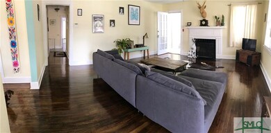 View of living room with hallway and access to sun