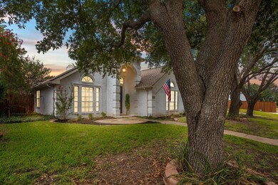 View of front facade with a lawn