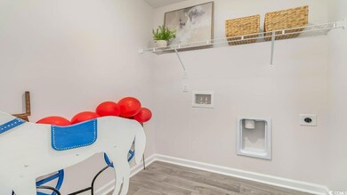 Clothes washing area with washer hookup, hookup fo