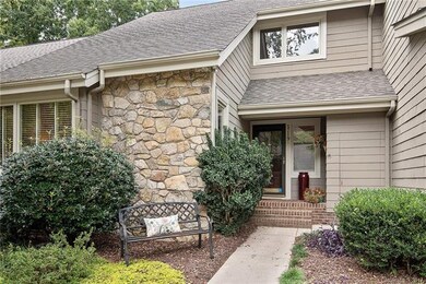 Pretty, stone accents invite you inside the front 