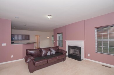 Cozy den with gas fireplace & surround sound! 