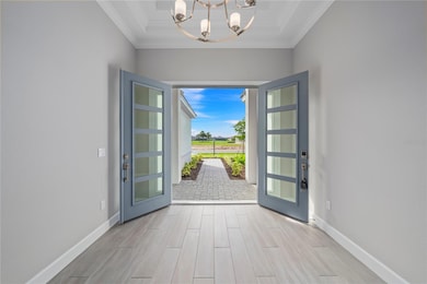 Upgraded glass, impact double doors at the entry.