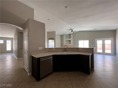 Kitchen with light tile patterned floors, light co