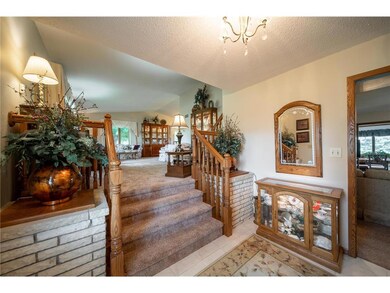 Front entry with brick columns that you have a woo