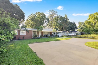 The curved driveway allows for ample parking
