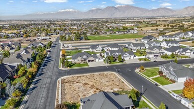 Aerial view of residential area with a mountain backdrop