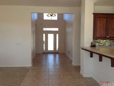 Oversized entry with cathedral ceiling