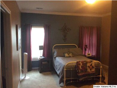 Master bedroom with walk-in closet and master bath