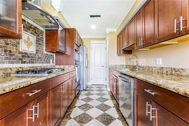 Beautiful kitchen with marble floors & granite cou