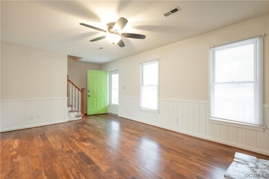 Unfurnished room featuring dark wood-type flooring