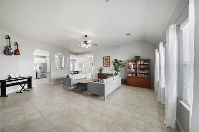 Large living room with high ceilings, wall of windows and fresh paint!