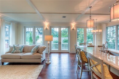 Three walls of windows and French doors to let the