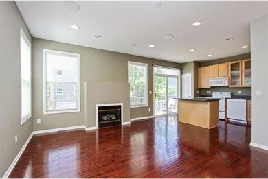 Dining room opens to kitchen, wood floors and gas 