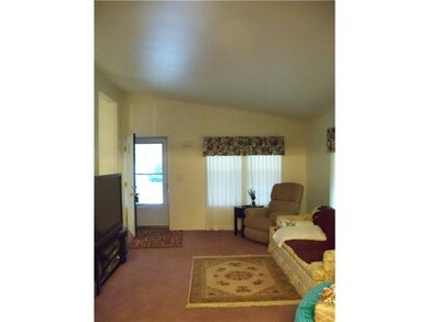 Living Room. Spacious Living Room with Vaulted Cei