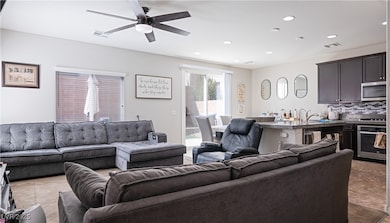 Living area featuring recessed lighting, visible v