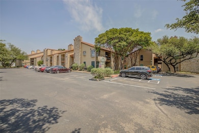Uncovered parking lot with a residential view