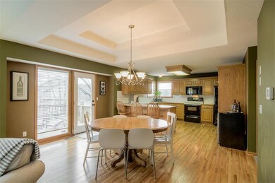 Dining and Kitchen Area with Vaulted Ceilings and 