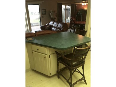 Kitchen opens to multi-purpose living space. Windo