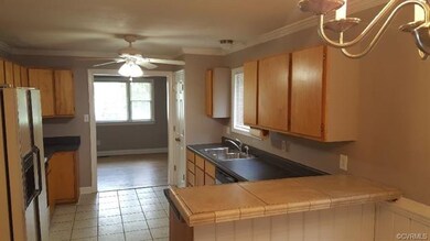 Kitchen with ceramic tile floor, new stainless dis