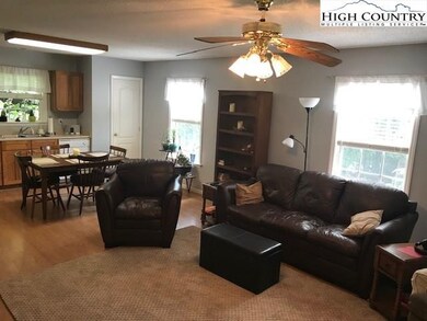 Living space flows into eat in kitchen area,