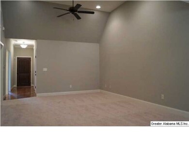 Great Room with vaulted ceiling, fan, and recessed