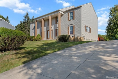 View of front of property featuring a front yard