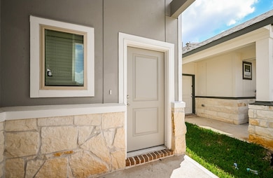 This home features a covered porch as well.