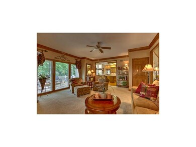 Wall of windows overlooking large deck!