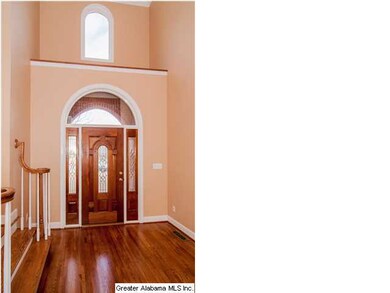 Beautiful two-story foyer welcomes you -- hardwood