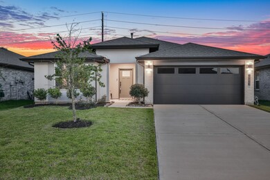 Beautiful front exterior w/immaculate landscape