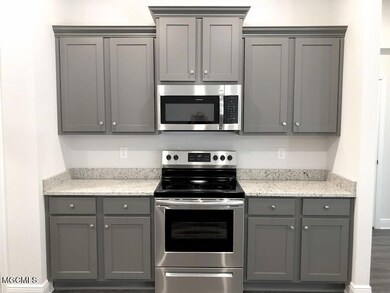 Graphite grey cabinets and dallas white